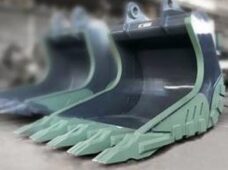 Aço especial amplia performance de caçamba graniteira